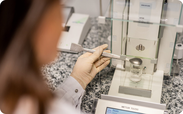 Researcher using laboratory equipment for hyaluronic acid research and development