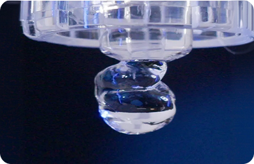 Close-up of viscous hyaluronic acid gel droplet, illustrating viscoelastic properties