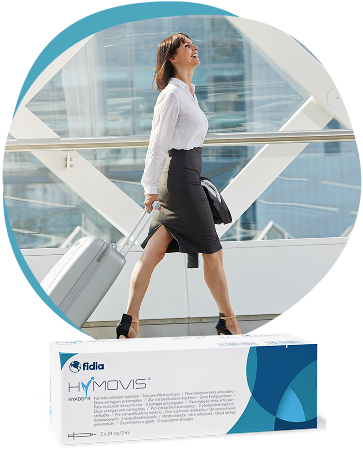 Businesswoman with luggage alongside HYMOVIS product box, representing active mobility from joint care treatment